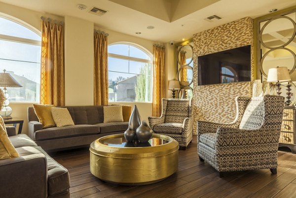 Modern clubhouse with elegant seating and pool table at SkyStone Apartments luxury community