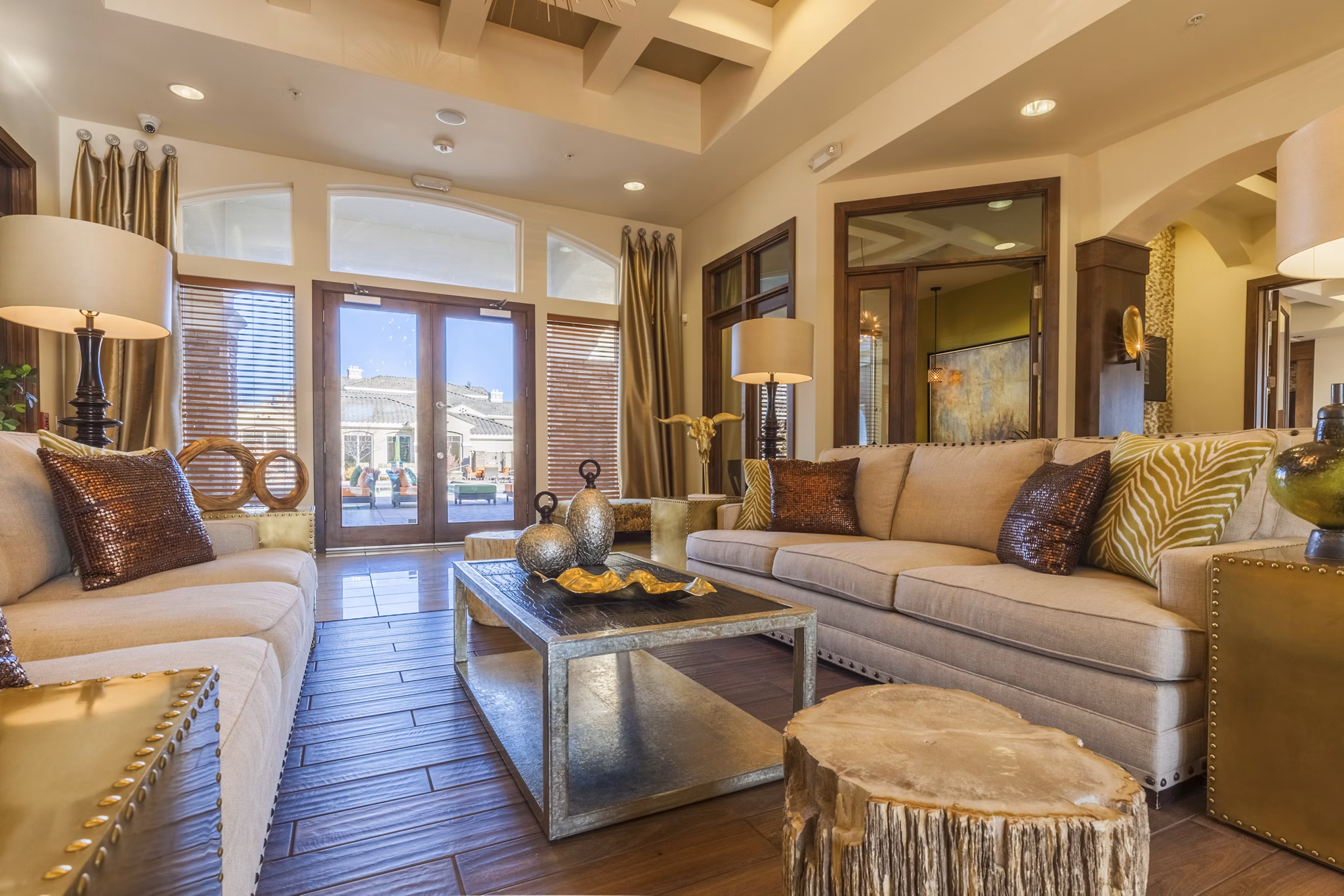 Modern clubhouse with lounge seating and billiards table at SkyStone Apartments in vibrant neighborhood
