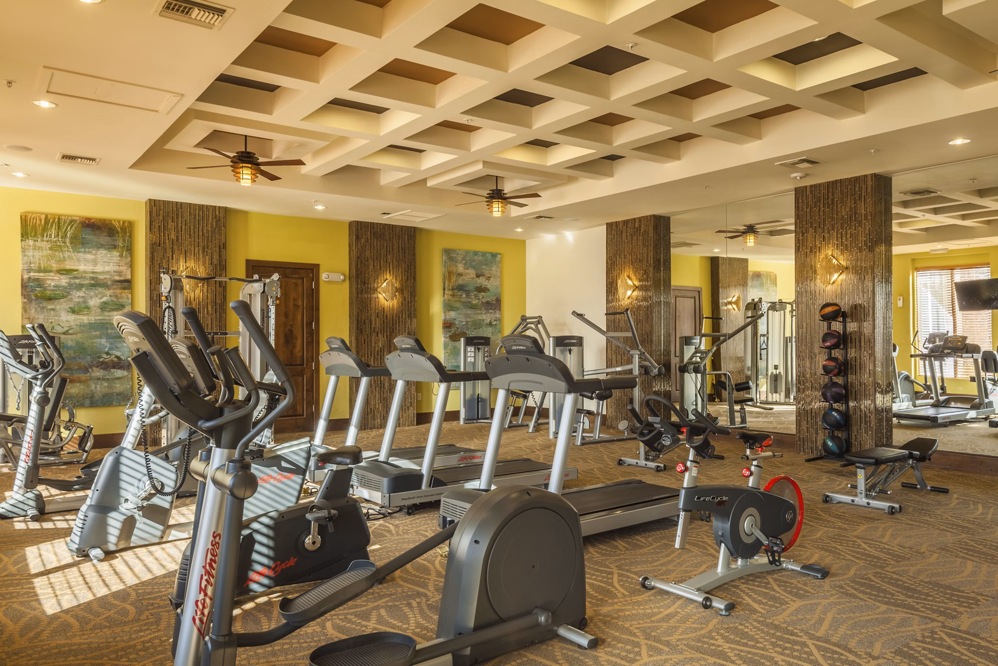 State-of-the-art fitness center with modern equipment at SkyStone Apartments