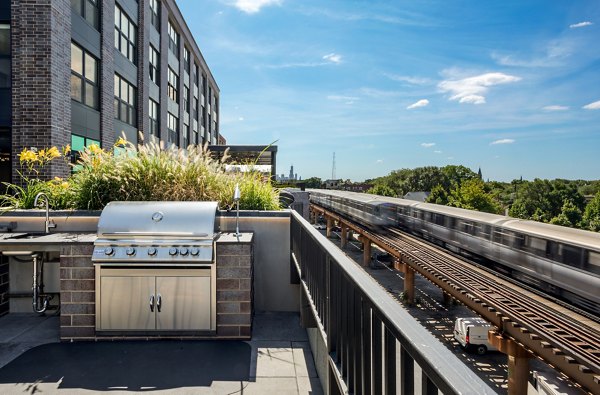 grill area/patio at Logan Apartments
