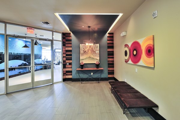 Leasing office lobby with modern decor and seating at 422 at the Lake Apartments