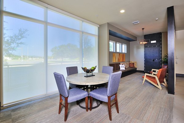 Clubhouse meeting facility featuring modern design at 422 at the Lake Apartments, perfect for gatherings and events