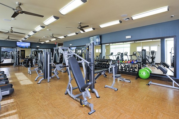 Modern fitness center with state-of-the-art equipment at 422 at the Lake Apartments
