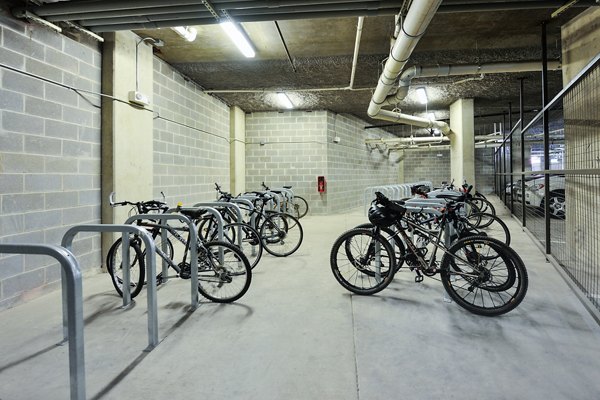 Bike storage area with modern racks at 422 at the Lake Apartments, a Greystar community in Austin, Texas, providing convenient cycling solutions