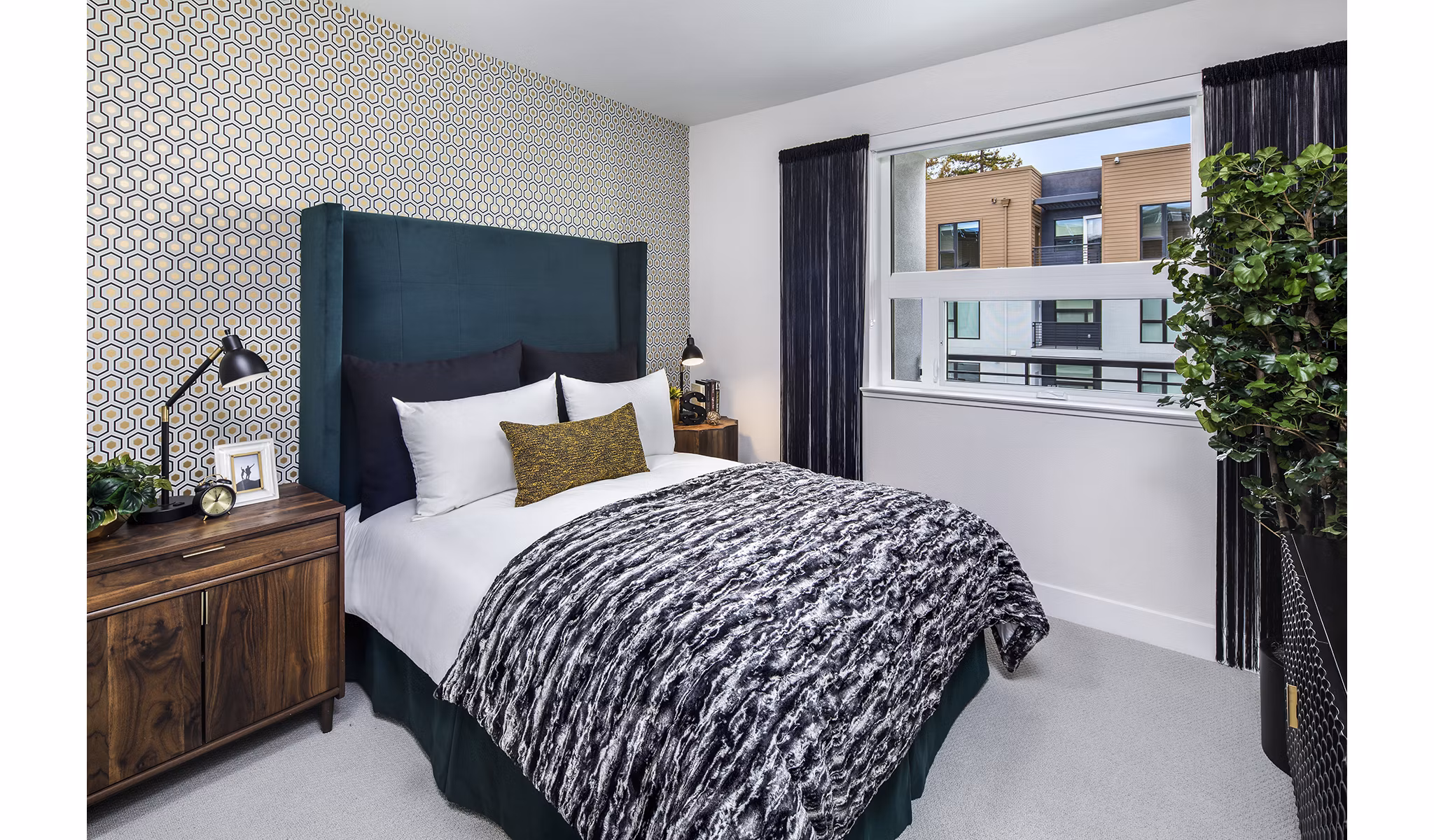 Cozy bedroom with elegant decor at Savoy Apartments