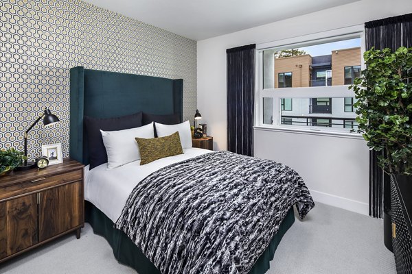 Cozy bedroom with elegant decor at Savoy Apartments