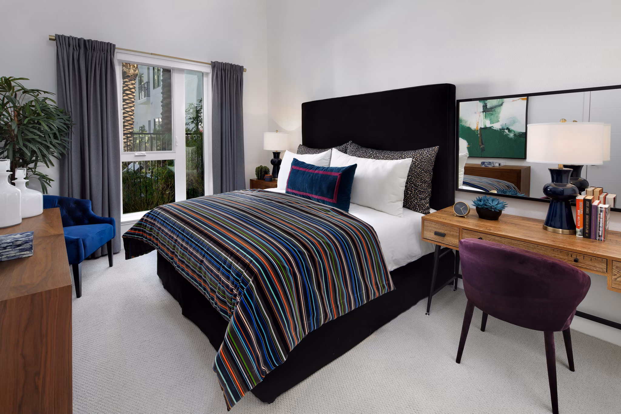Luxurious bedroom featuring modern design and cozy ambiance at Savoy Apartments