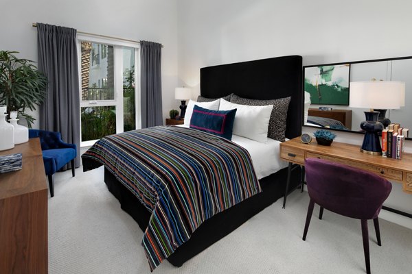 Luxurious bedroom featuring modern design and cozy ambiance at Savoy Apartments