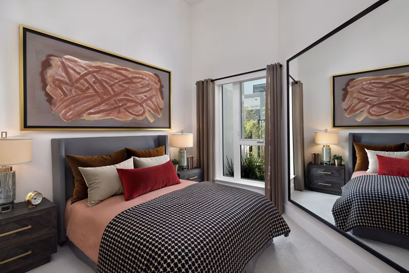 Modern bedroom with stylish decor at Savoy Apartments