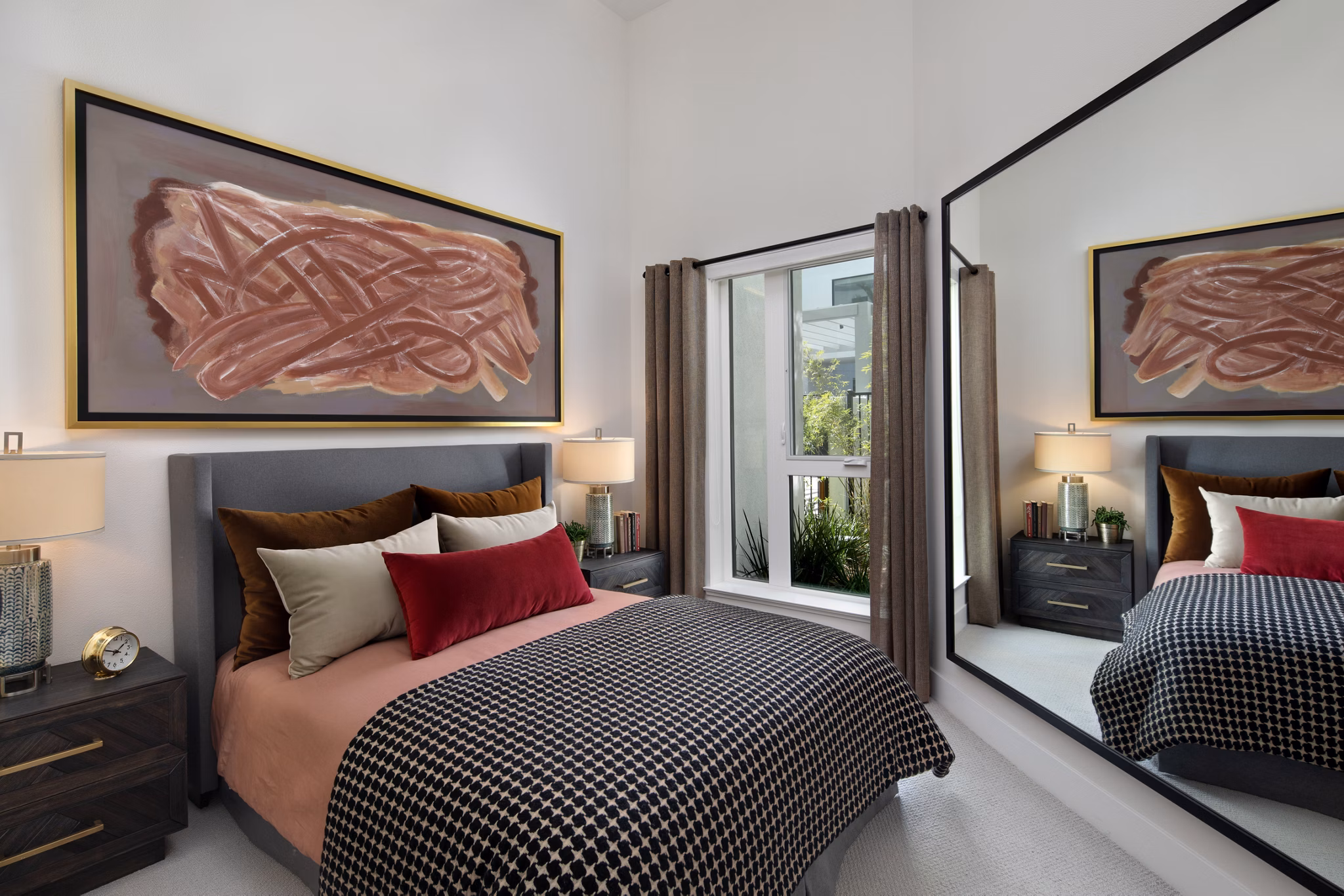 Modern bedroom with stylish decor at Savoy Apartments