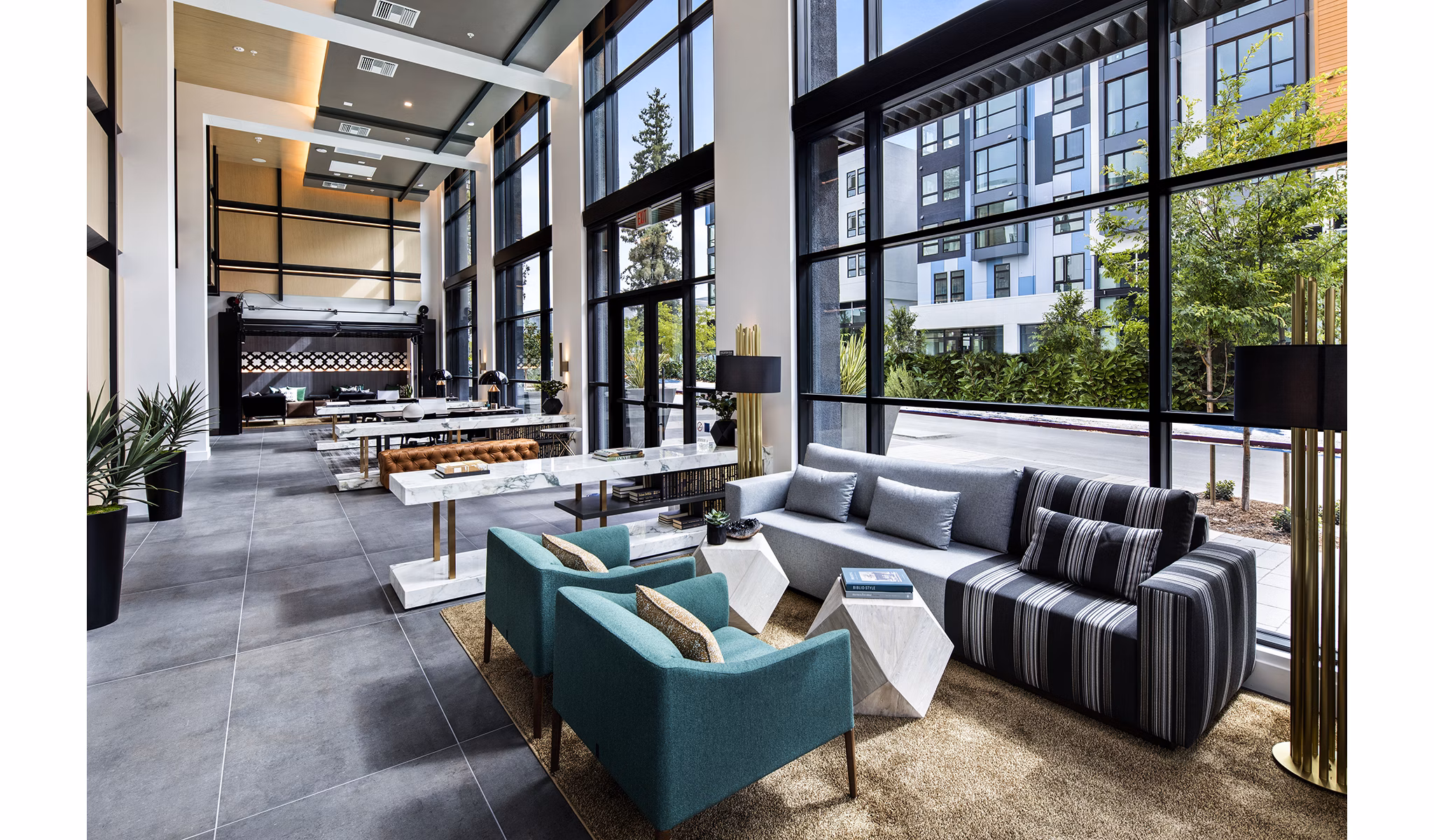 Elegant clubhouse/lobby with modern furnishings at Savoy Apartments