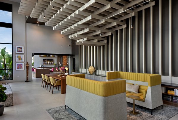 Elegant clubhouse with modern furnishings at Savoy Apartments, a Greystar luxury community
