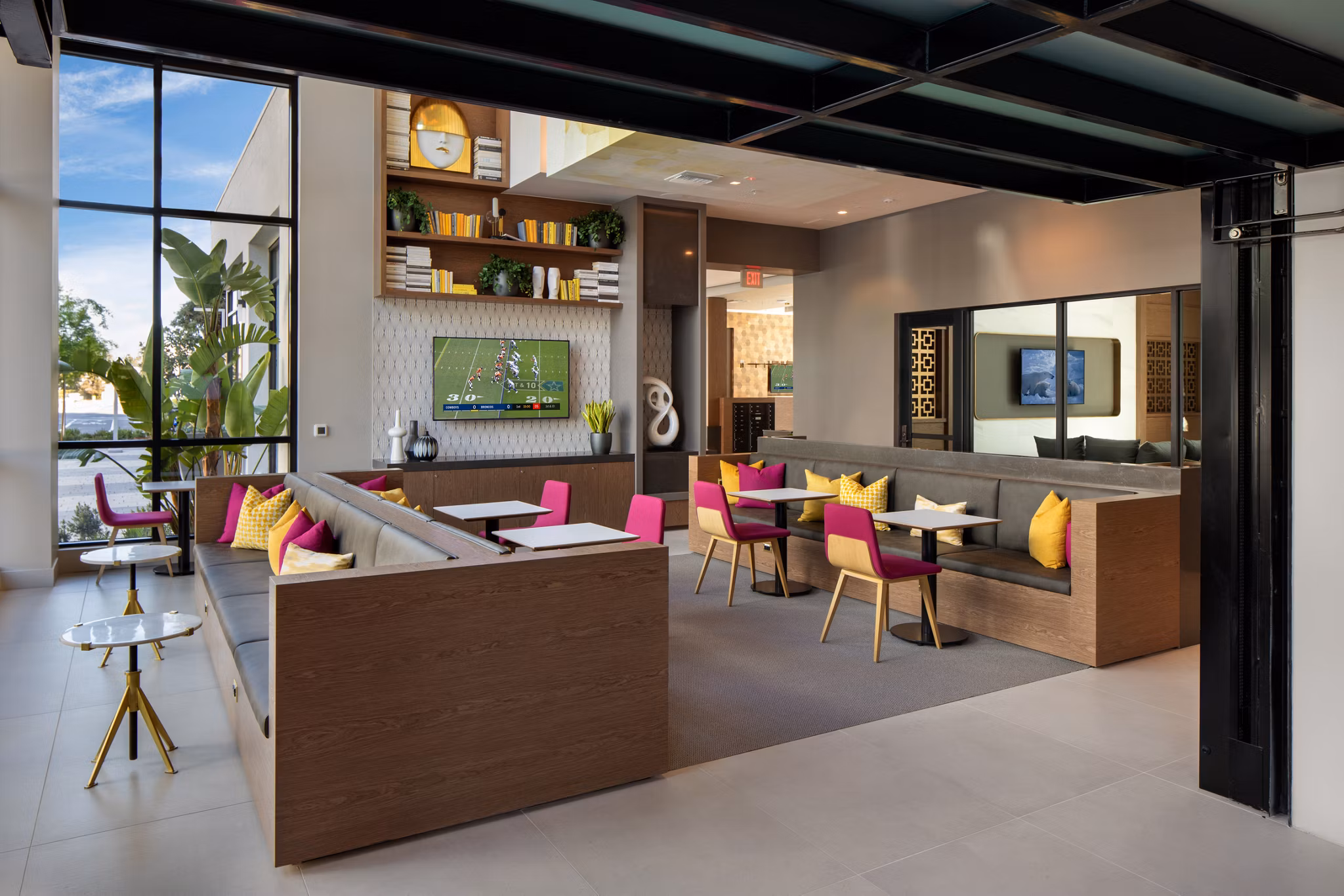 Clubhouse featuring modern design and social spaces at Savoy Apartments
