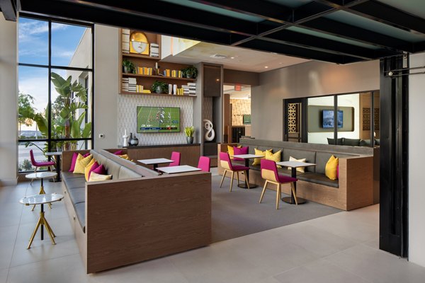 Clubhouse featuring modern design and social spaces at Savoy Apartments