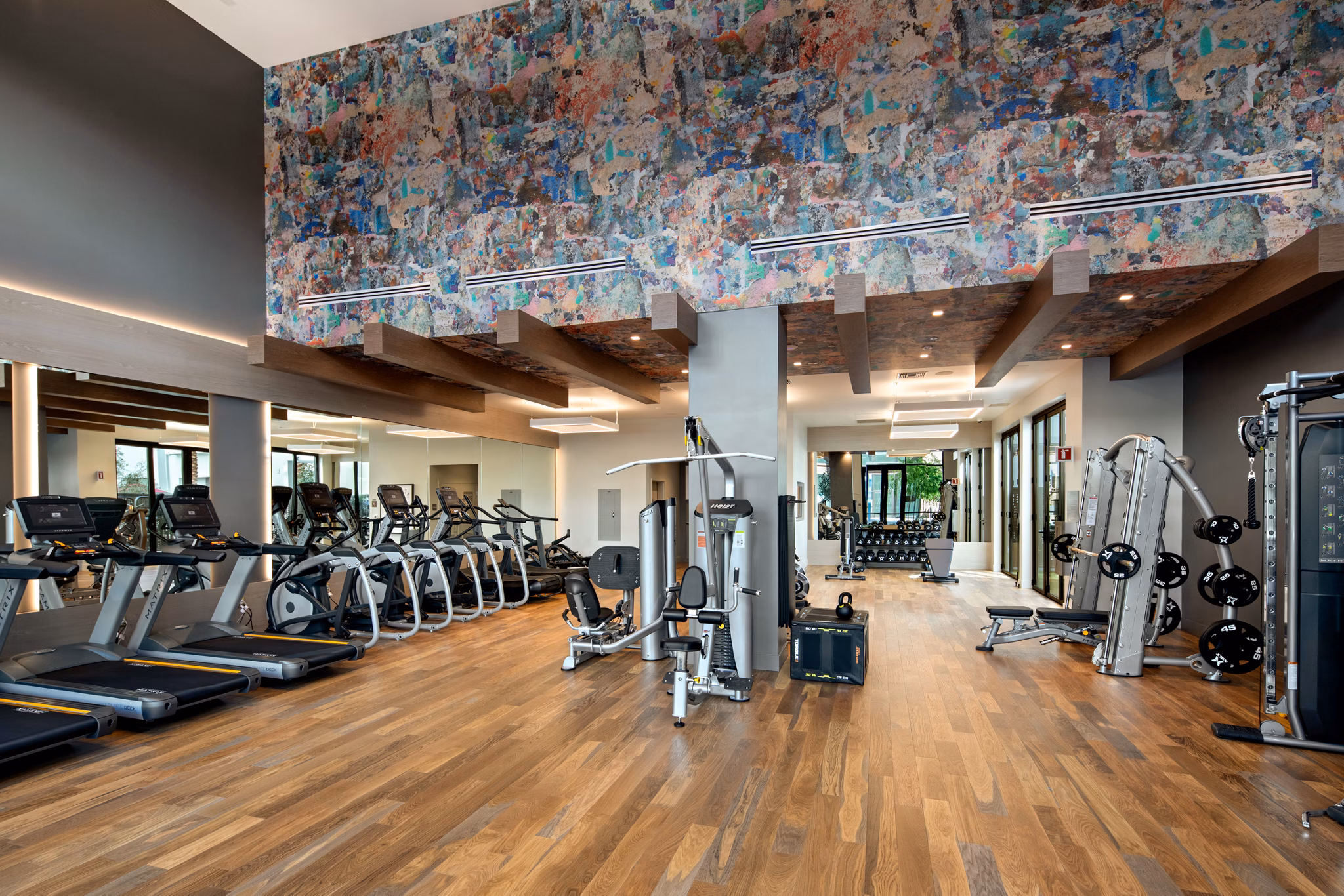 Modern fitness center featuring state-of-the-art equipment at Savoy Apartments