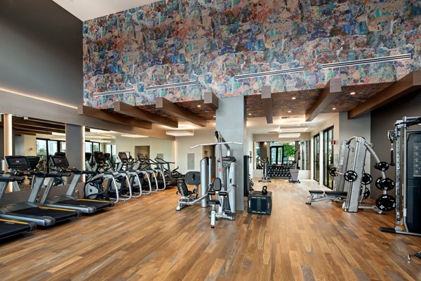Modern fitness center featuring state-of-the-art equipment at Savoy Apartments