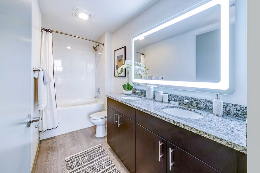 Bathroom featuring modern fixtures at Navette on the Bay Apartments