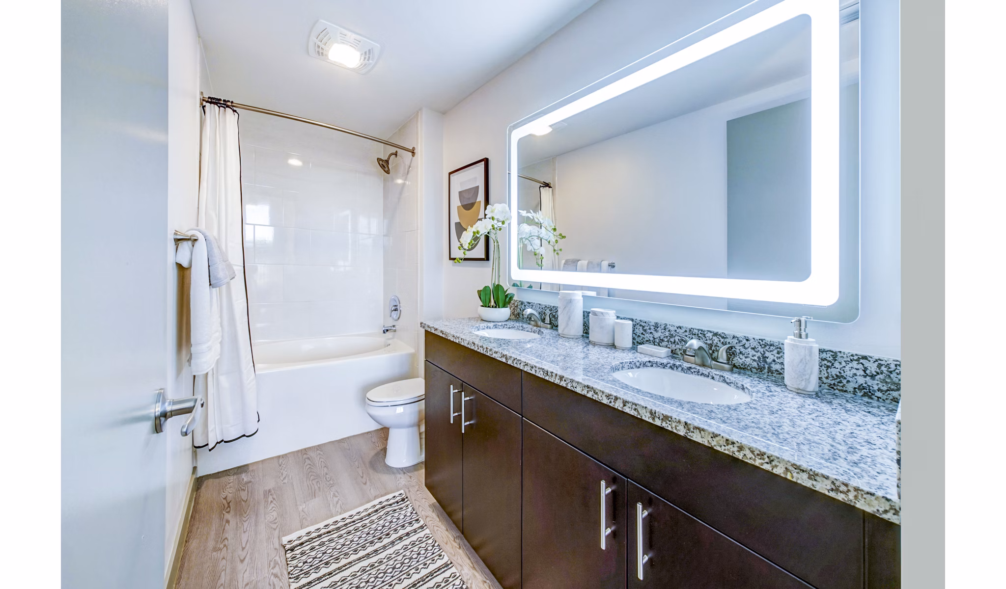 Bathroom featuring modern fixtures at Navette on the Bay Apartments