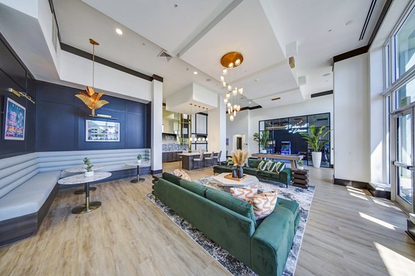 Clubhouse featuring modern design and lounge spaces at Navette on the Bay Apartments