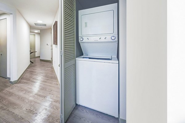 laundry room at Navette on the Bay Apartments