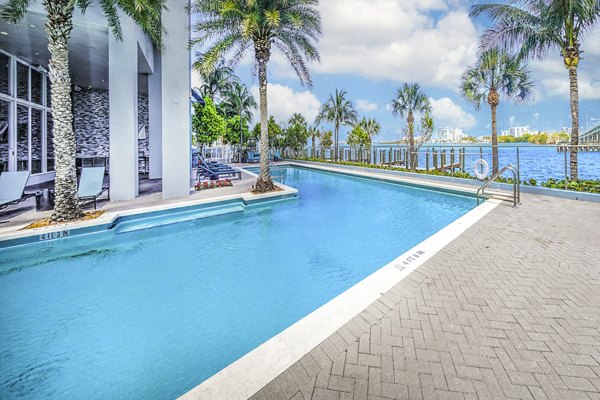 Luxury pool with stunning bay views at Navette on the Bay Apartments Enjoy relaxation and recreation in this premier waterfront community