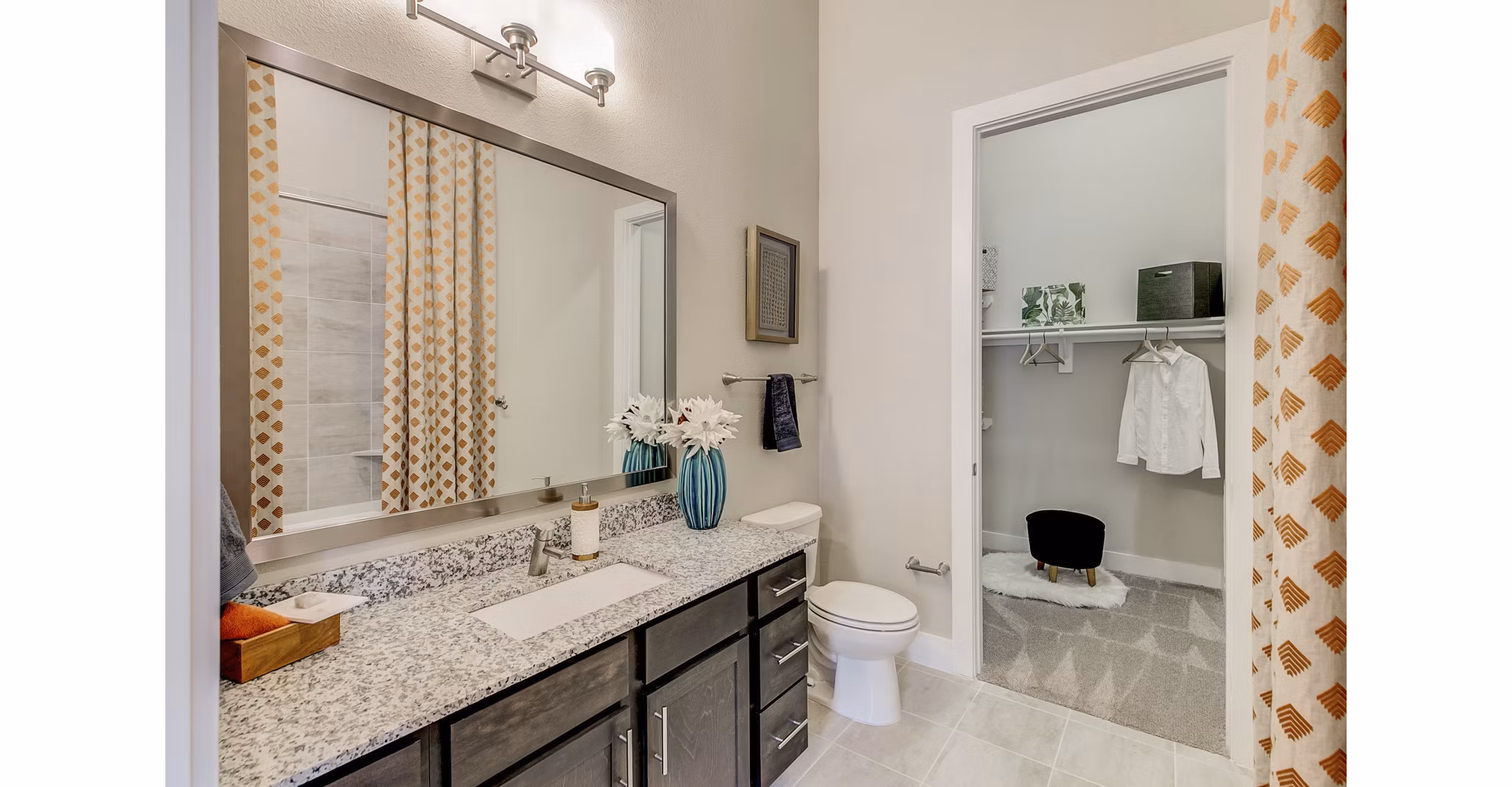 Modern bathroom with sleek fixtures at Eastbank Riverwalk Apartments, featuring elegant design and premium amenities in luxury living