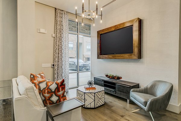 Elegant clubhouse at Eastbank Riverwalk Apartments boasting modern design and cozy seating, perfect for community gatherings or relaxation