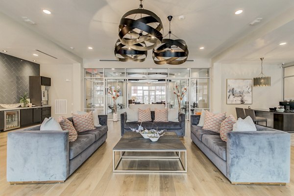 Clubhouse featuring modern design and social spaces at Eastbank Riverwalk Apartments