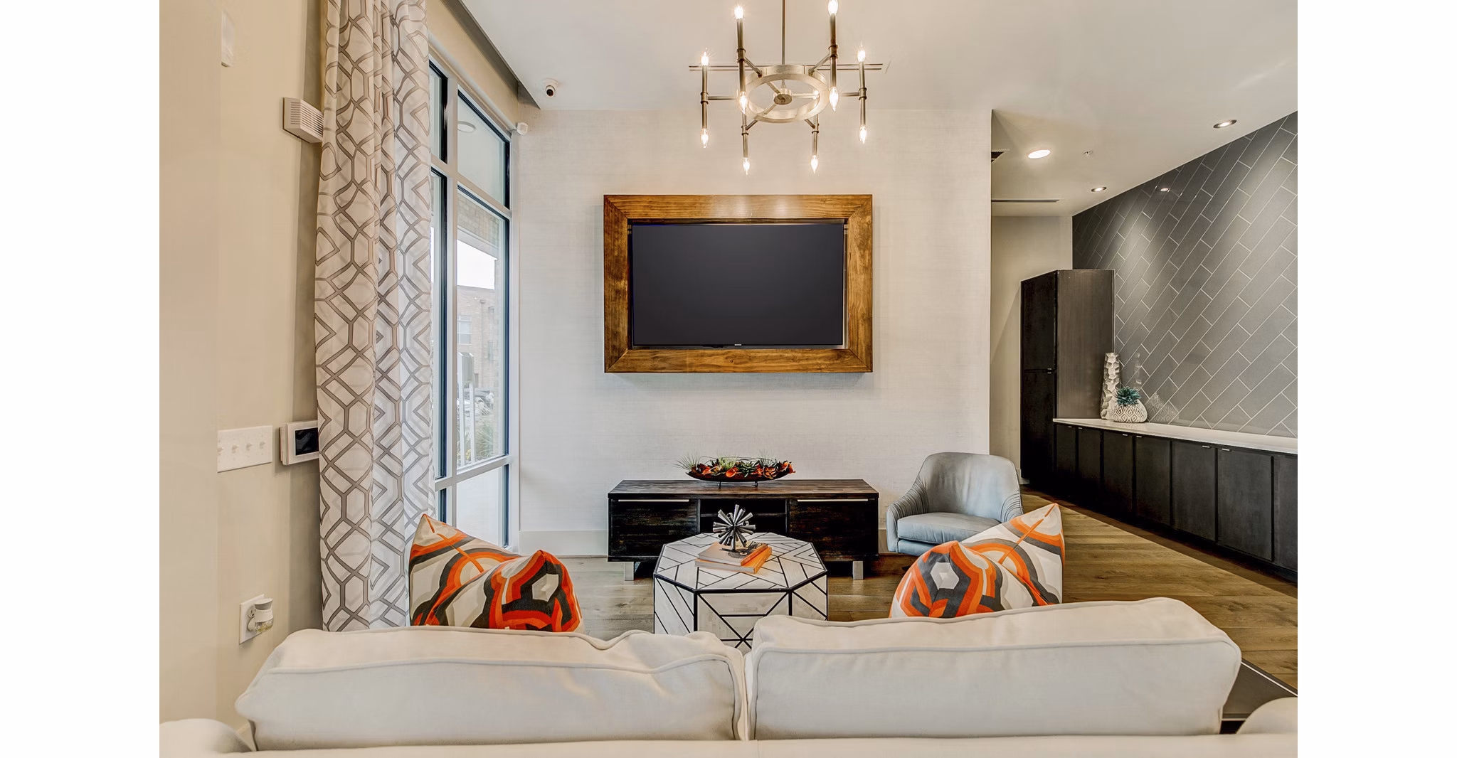 Clubhouse with modern decor and comfortable seating at Eastbank Riverwalk Apartments