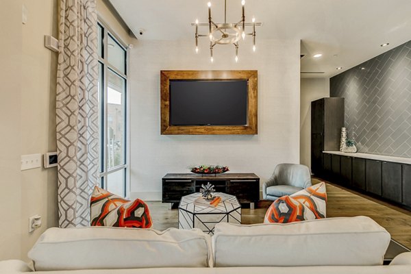 Clubhouse with modern decor and comfortable seating at Eastbank Riverwalk Apartments