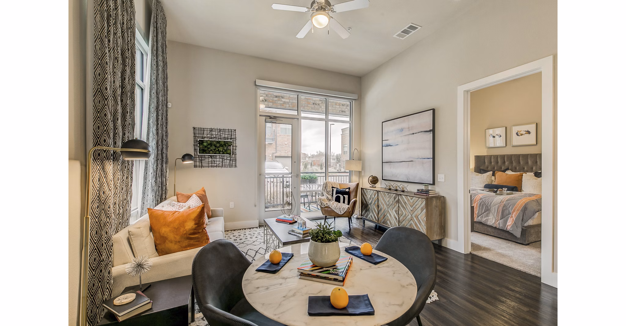 Spacious living room with modern decor at Eastbank Riverwalk Apartments