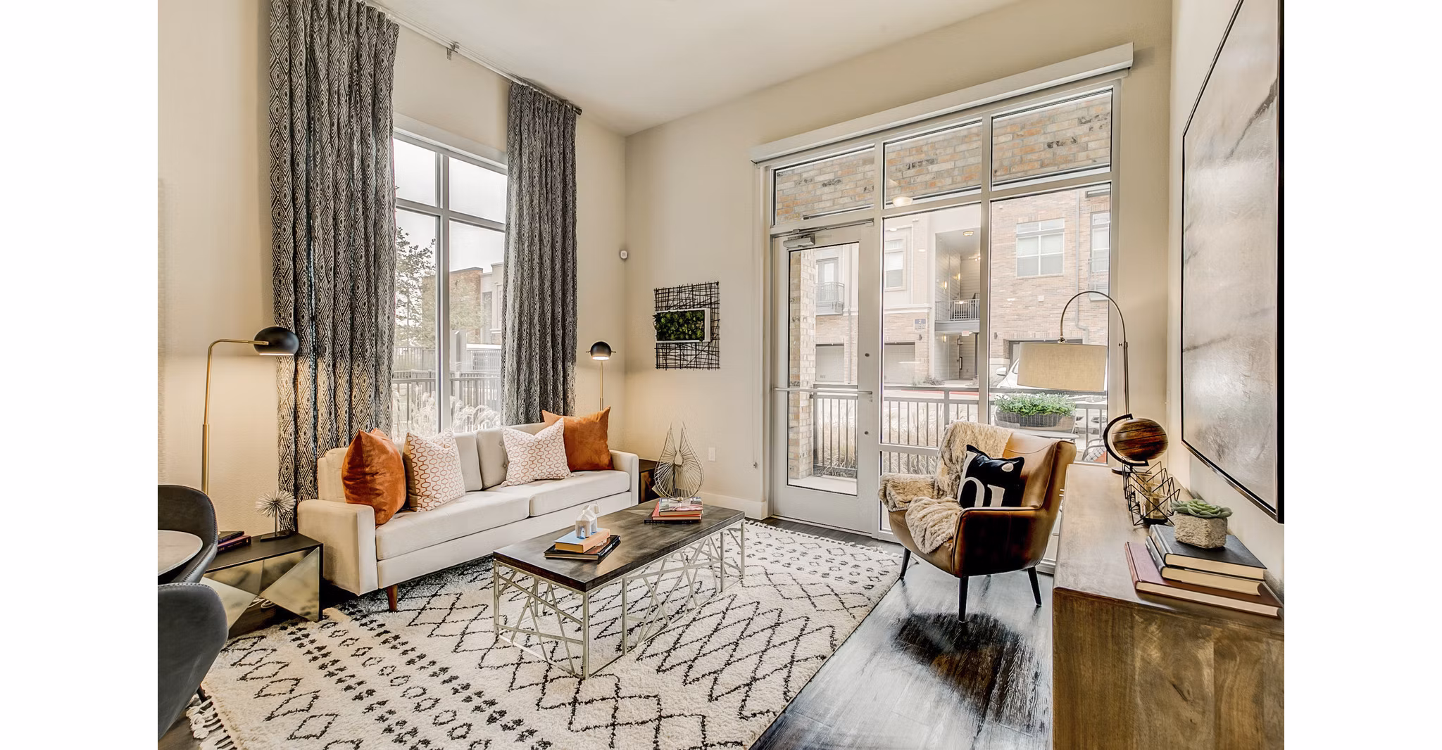 Spacious living room with modern furnishings at Eastbank Riverwalk Apartments, luxurious Greystar property