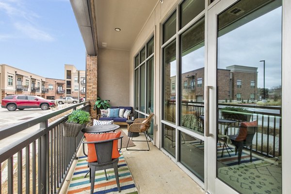 Riverside view from a stylish patio at Eastbank Riverwalk Apartments
