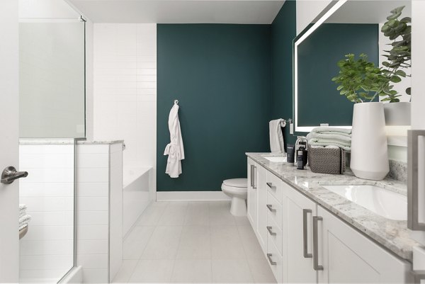 Modern bathroom with elegant fixtures at Elan Madison Yards Apartments, luxury living in a vibrant community setting