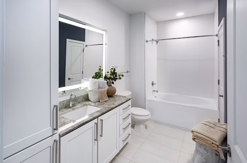 Modern bathroom featuring sleek fixtures at Elan Madison Yards Apartments