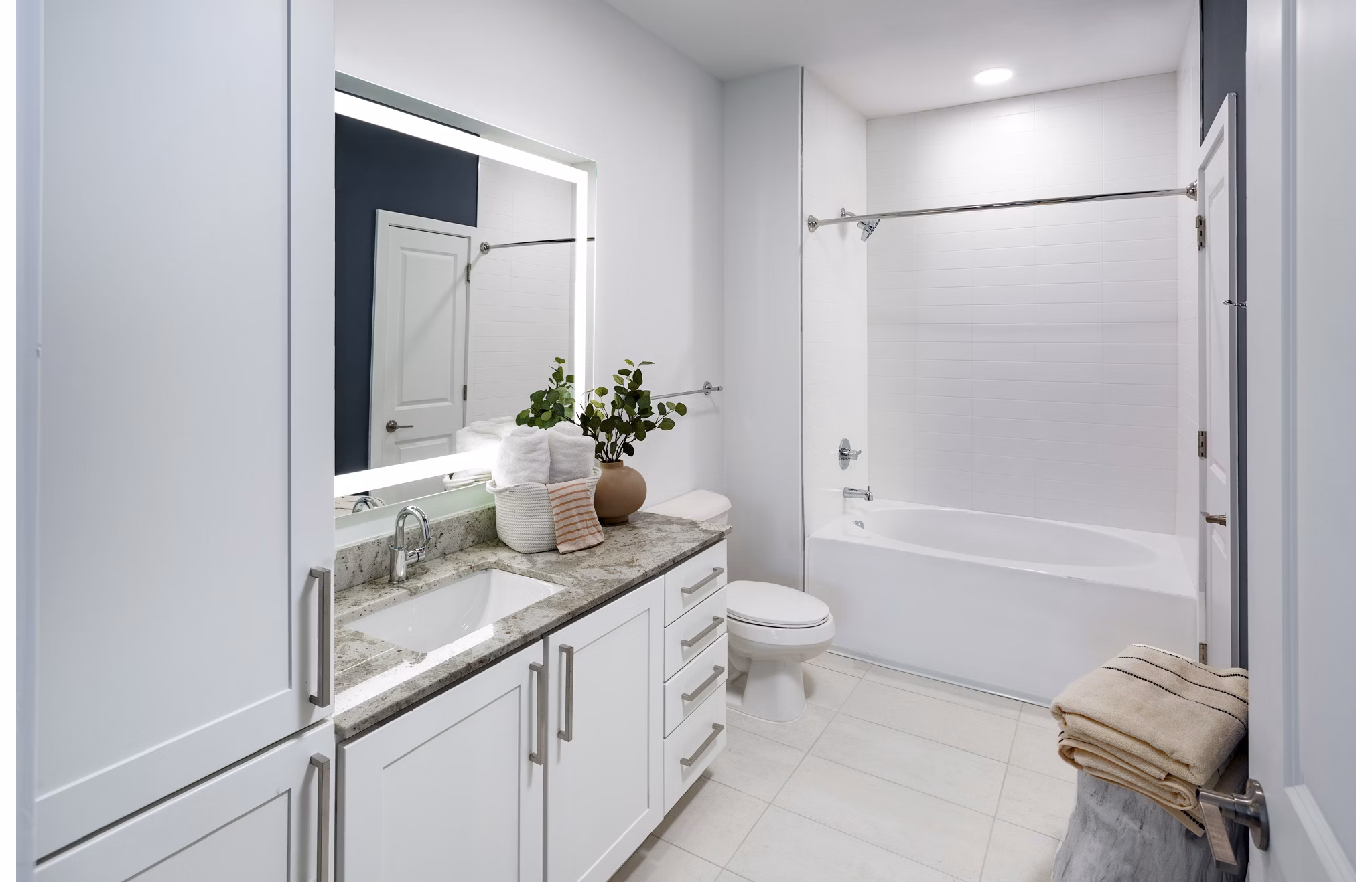 Modern bathroom featuring sleek fixtures at Elan Madison Yards Apartments