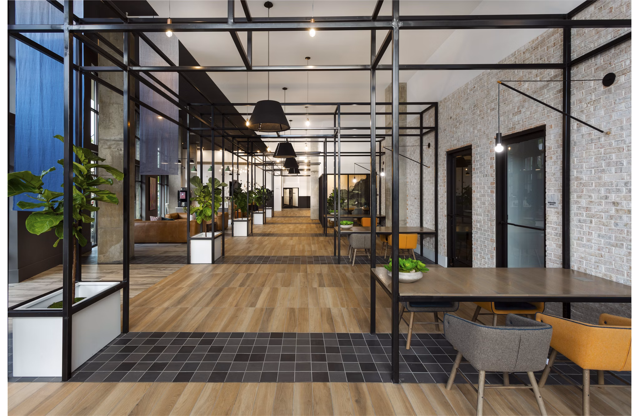 Clubhouse featuring modern design and communal spaces at Elan Madison Yards Apartments