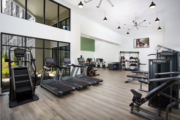 State-of-the-art fitness center with modern equipment at Elan Madison Yards Apartments