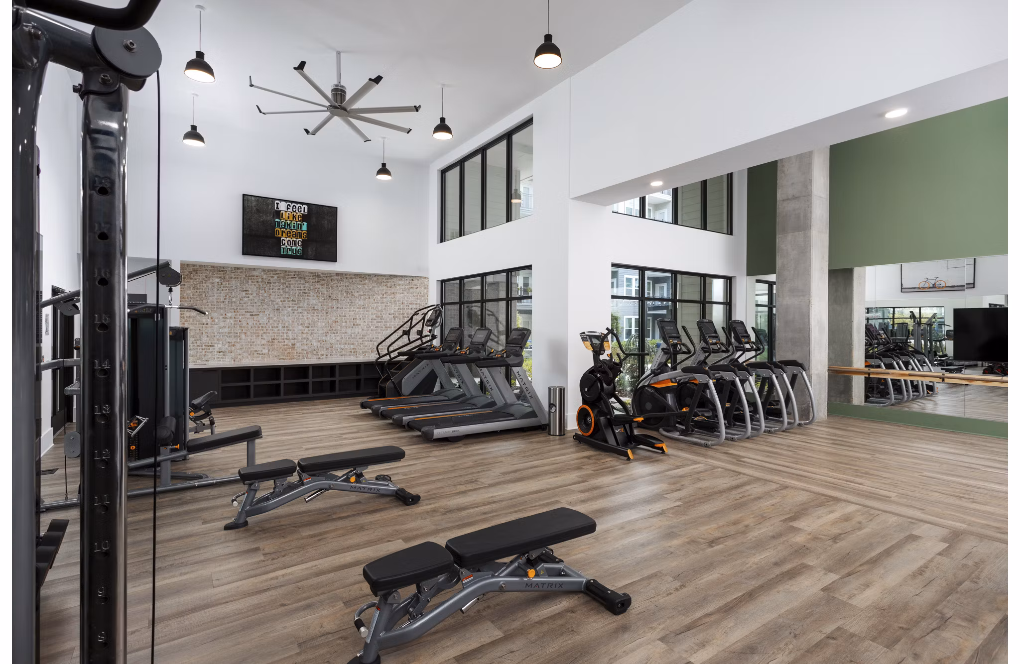 Modern fitness center with state-of-the-art equipment at Elan Madison Yards Apartments