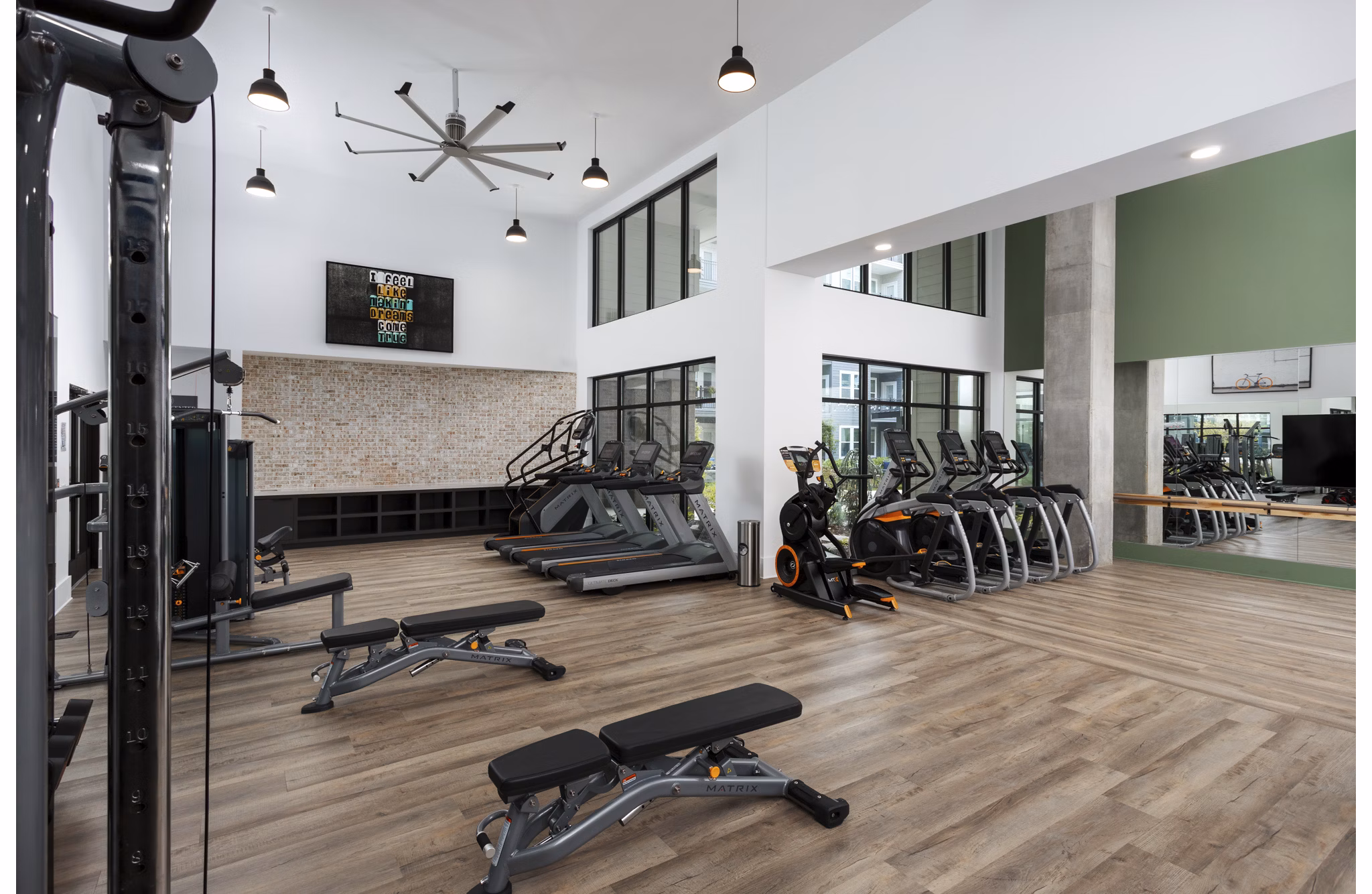 Modern fitness center with state-of-the-art equipment at Elan Madison Yards Apartments