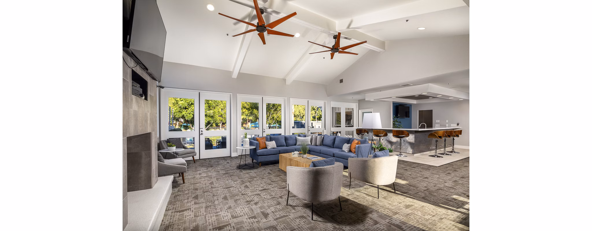 Clubhouse with modern design and ample seating at Presidio at Rancho Del Oro Apartments, a Greystar luxury community in Oceanside