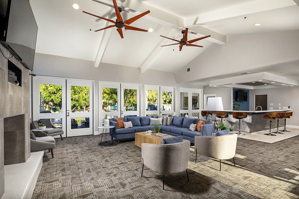 Clubhouse with modern design and ample seating at Presidio at Rancho Del Oro Apartments, a Greystar luxury community in Oceanside