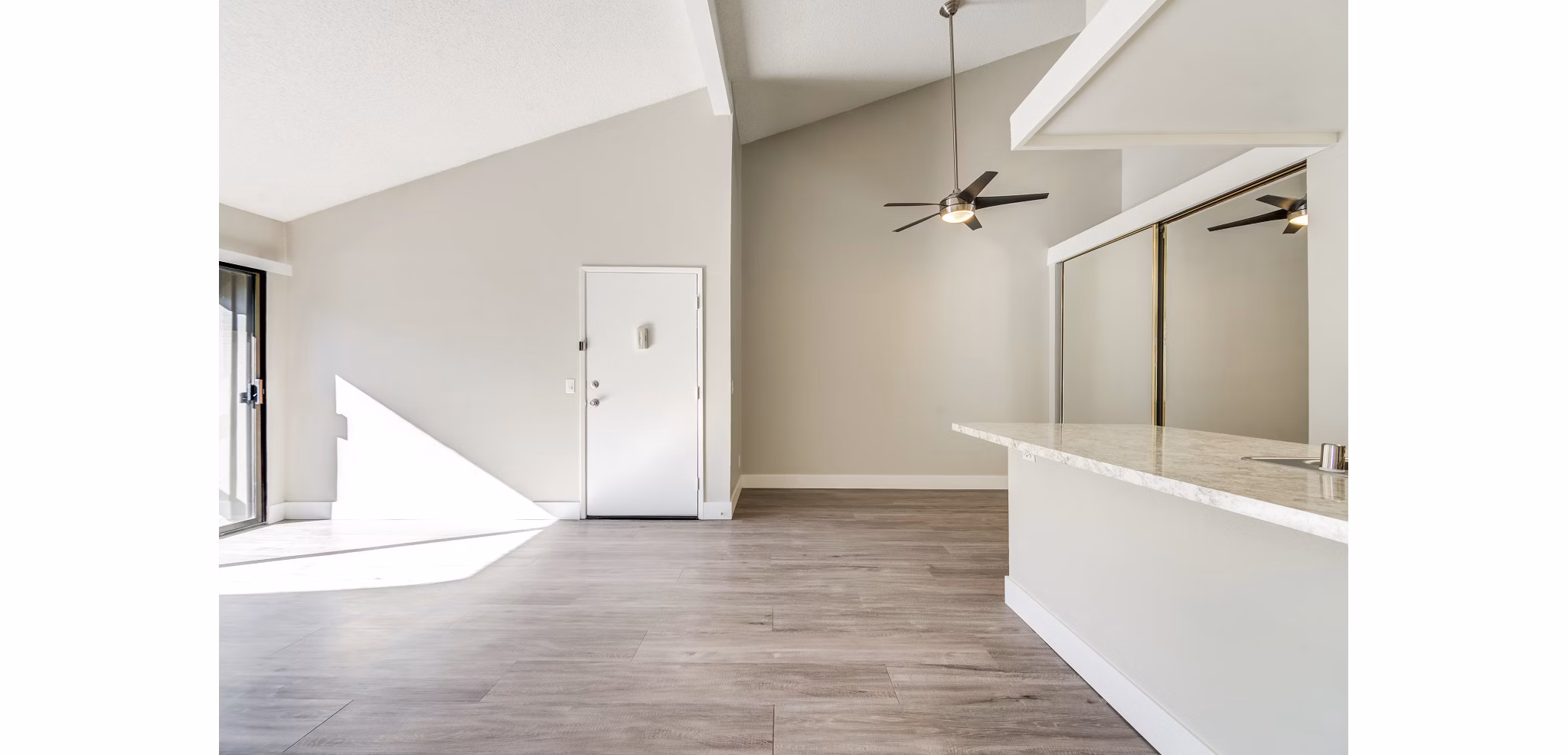 Spacious living room with modern decor at Presidio at Rancho Del Oro Apartments