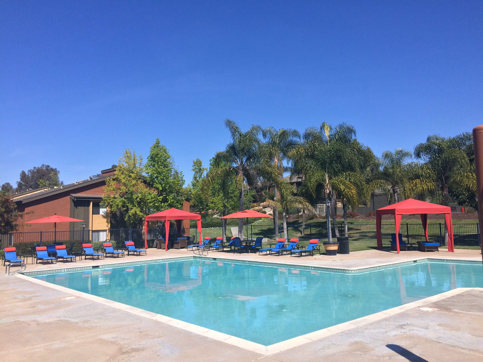 Inviting outdoor pool at Presidio at Rancho Del Oro Apartments