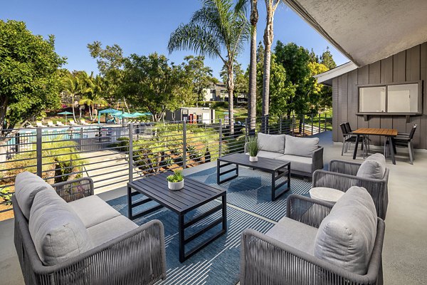 Spacious rooftop deck with lounge seating at Presidio at Rancho Del Oro Apartments offering panoramic views and relaxation space