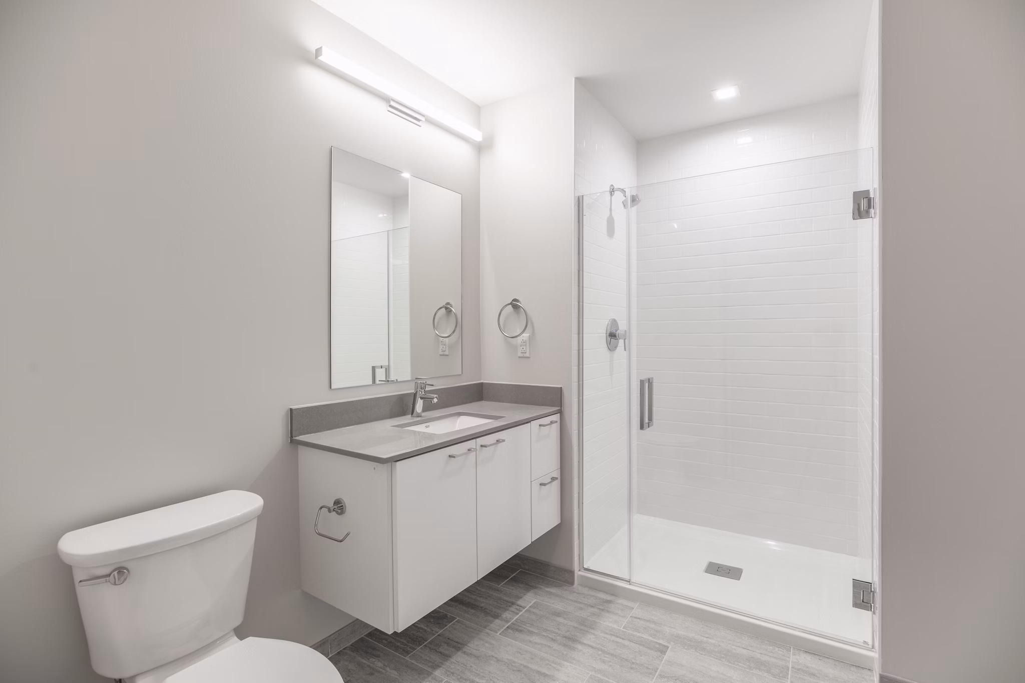 Modern bathroom with sleek fixtures at The Chestnut Apartments, a luxury residences under the Greystar brand