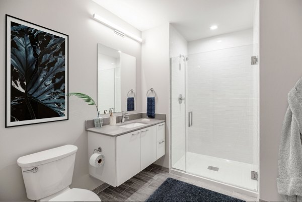 Modern bathroom with sleek fixtures at The Chestnut Apartments, showcasing luxury living in a Greystar property