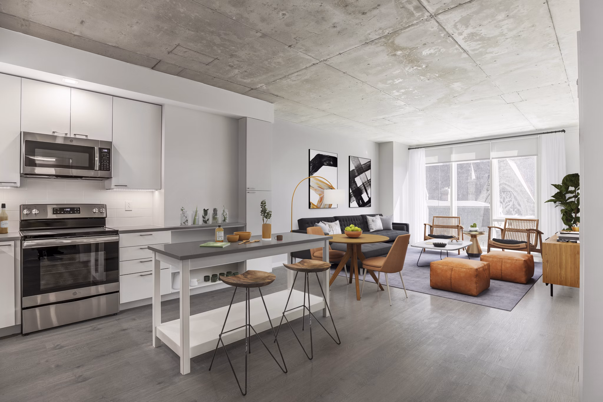 Modern kitchen with sleek countertops and stainless steel appliances at The Chestnut Apartments luxury living