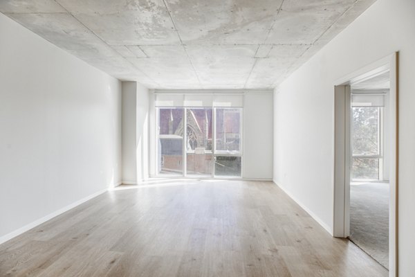 Spacious living room with modern decor at The Chestnut Apartments