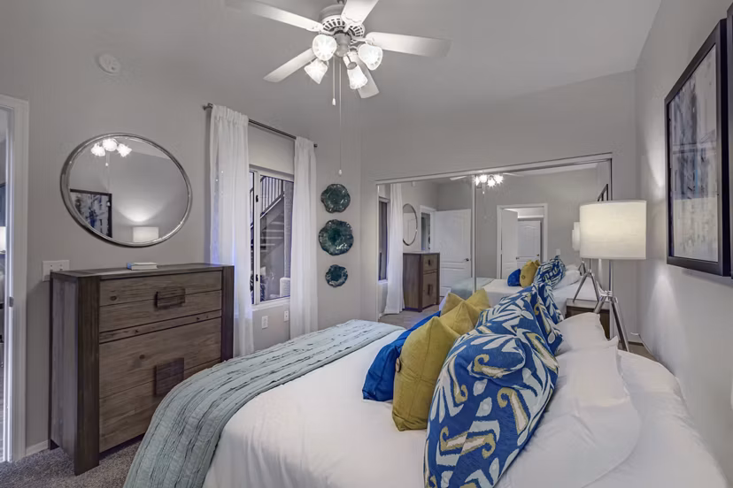 Cozy bedroom with modern furnishings at Springs at Continental Ranch Apartments